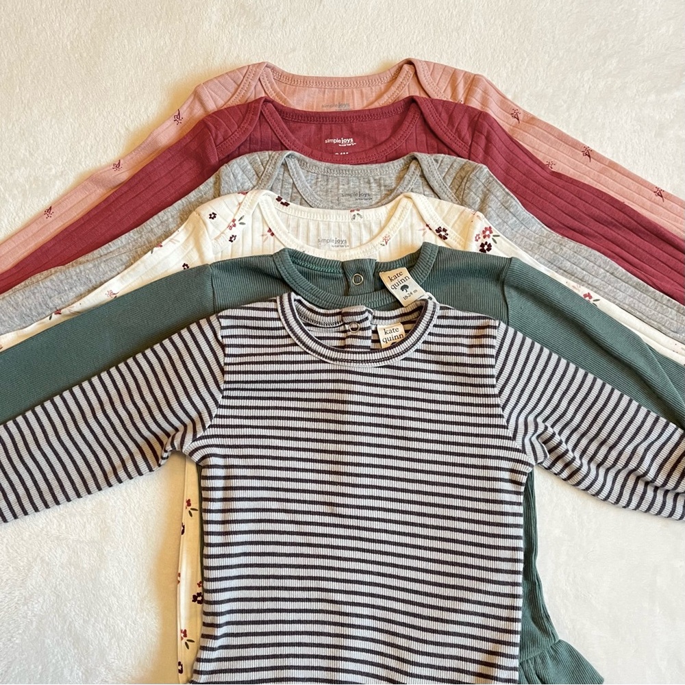 Kate Quinn Kids Bodysuits in Pink, Cream, Green, and Gray